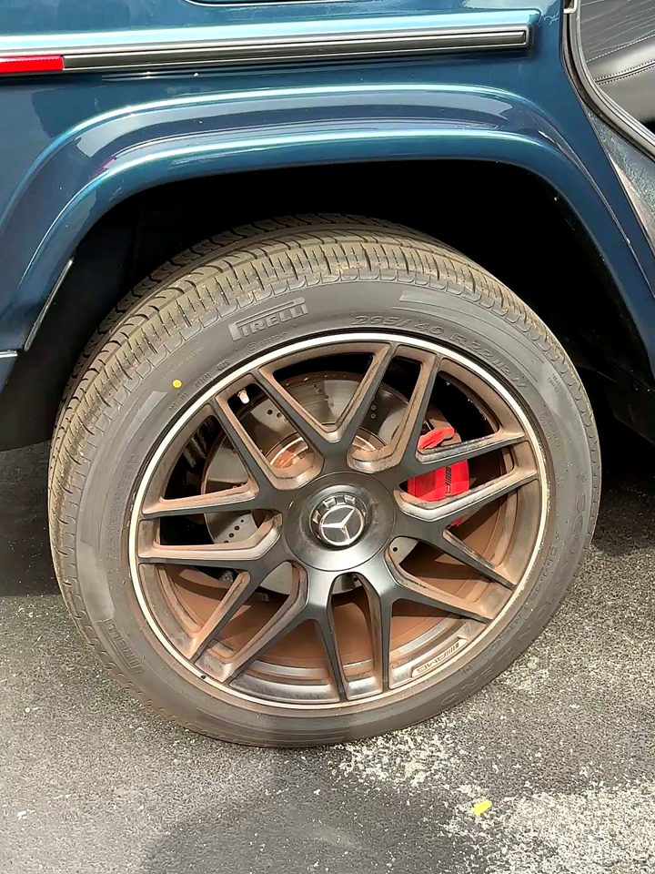 Mercedes-AMG G63 wheel caked in brown brake dust before a wheel cleaning.