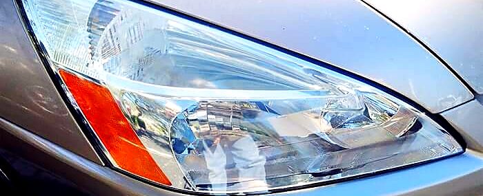 The same headlight, clear, after restoration.