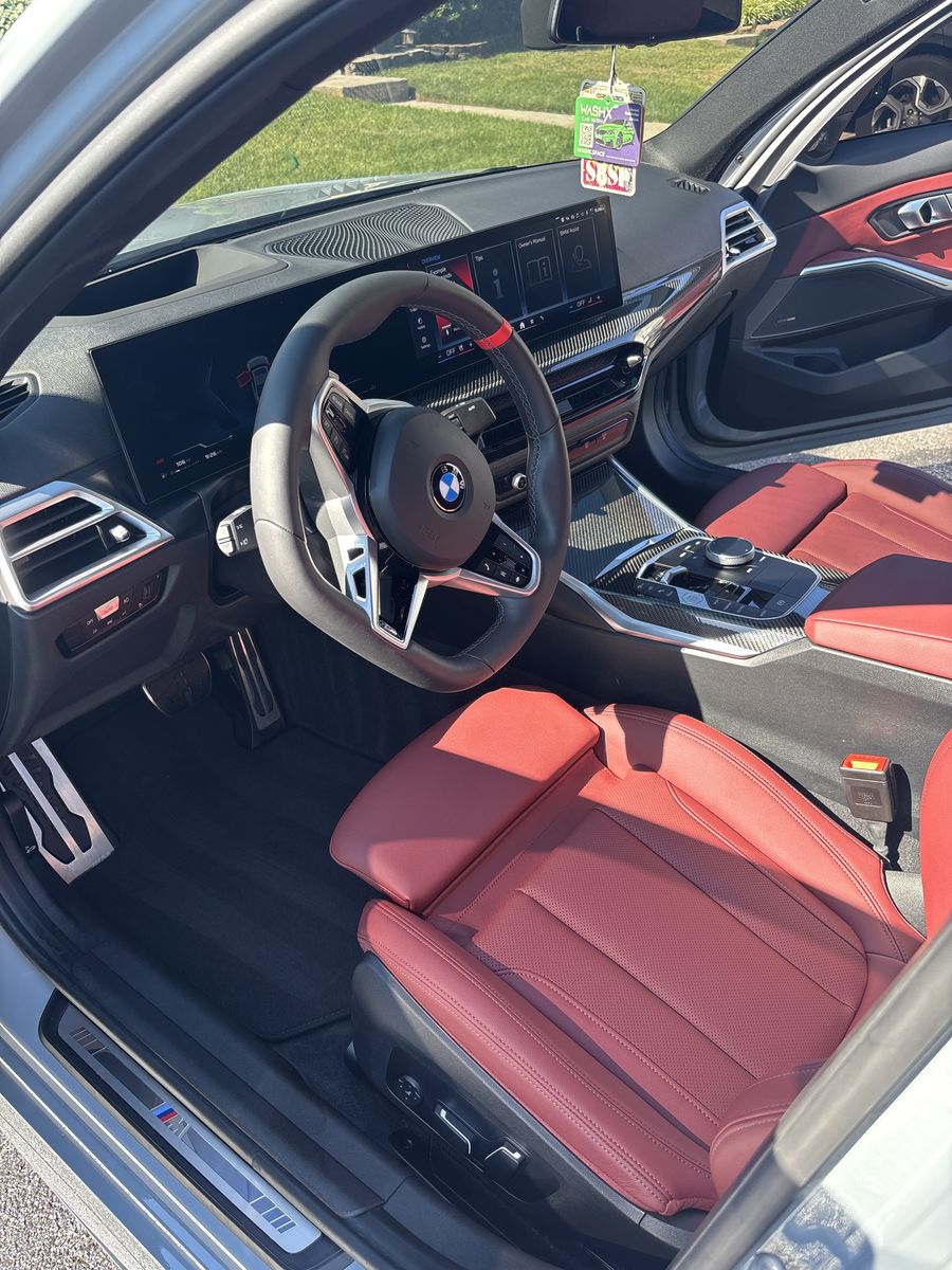 BMW M interior with red leather seats after an interior detail.