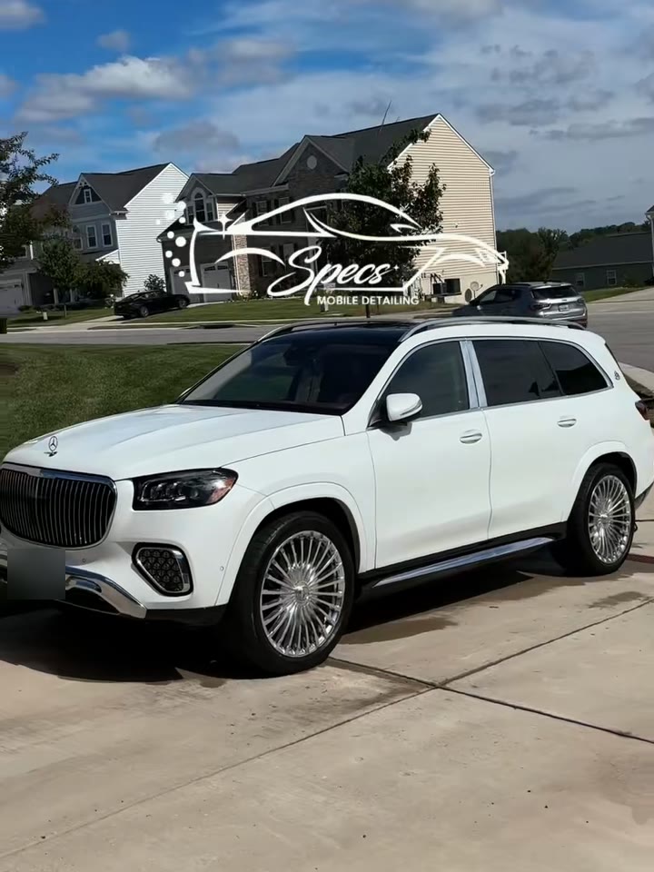 White Mercedes-Maybach GLS in a driveway after a mobile detail.